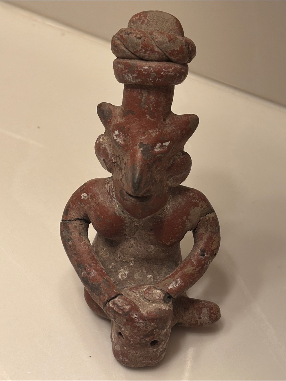 Possible Late Classic Maya Jaina/Campeche Terracotta Figure – Seated Figure Hold